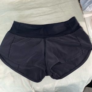black lululemon running shorts